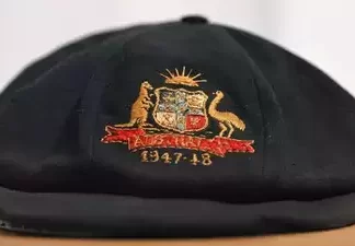 Don Bradman’s Legendary Baggy Green Cap Fetches Crores in Auction: A Historic Cricket Memorabilia The Baggy Green Test cap of Australian cricket legend Sir Donald Bradman has set new records in the world of sports memorabilia. This historic cap, worn by Bradman during the 1947-48 series against India, was recently sold at auction for an astounding $390,000 (Rs 2.14 crore). With auction fees, the price soared to $479,700 (Rs 2.63 crore).